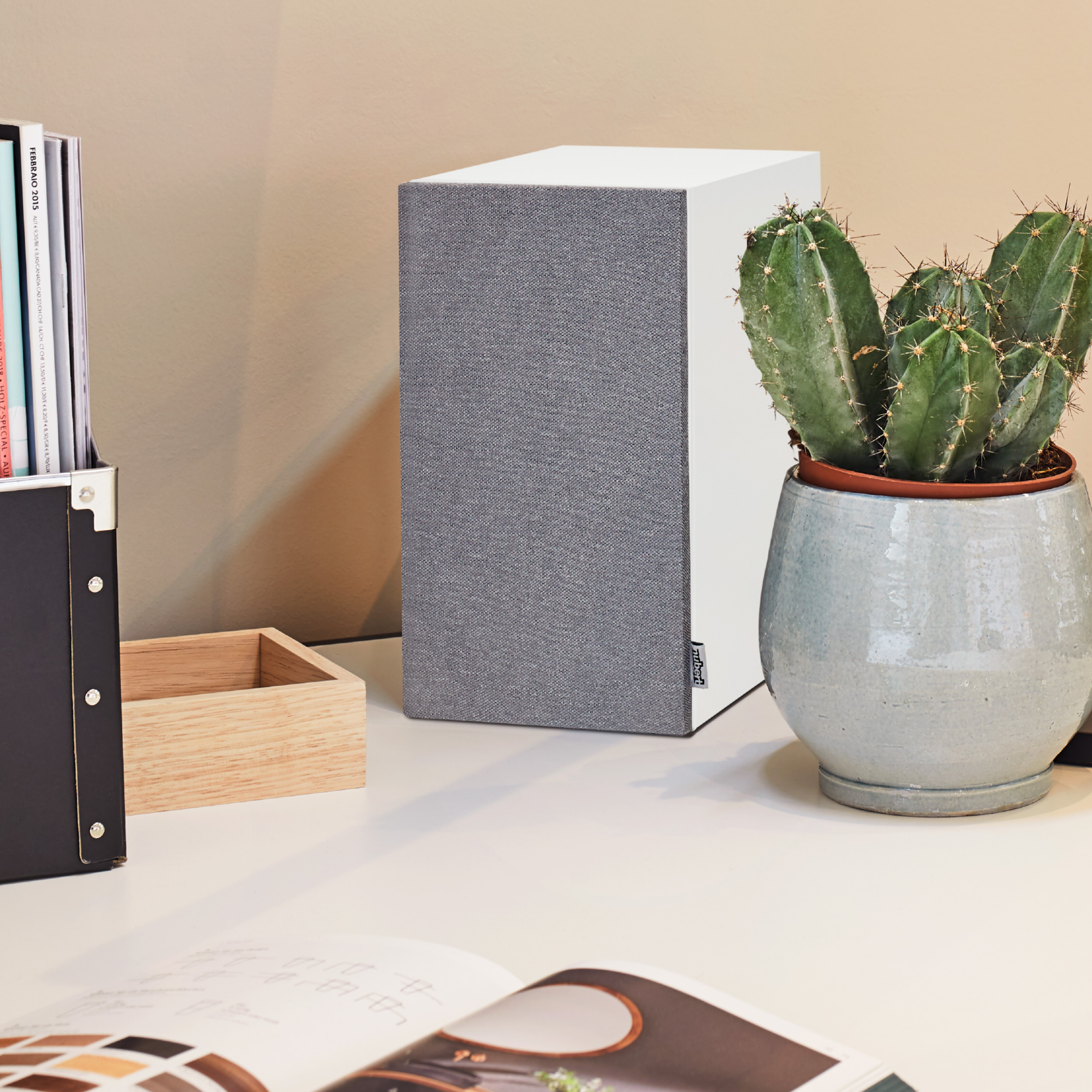 nuBoxx A 125 Pro Ambiente White nuBoxx A 125 Pro bookshelf loudspeaker on desk